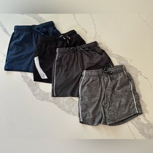 4 pair of Jumping Beans “basketball” shorts or active shorts.